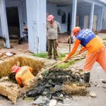 Caixa coletora é desobstruída no Alvorada 2, em Manaus